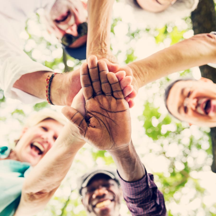 landing well group of senior retirement exercising togetherness